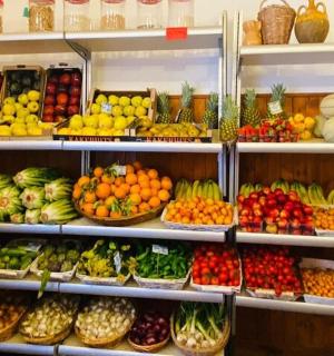 a store filled with lots of different fruits and vegetables