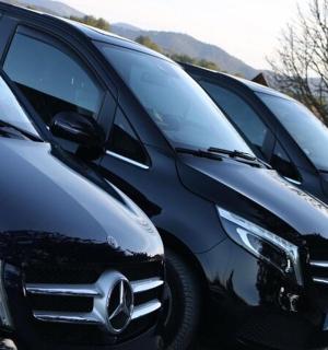 a row of parked trucks parked next to each other