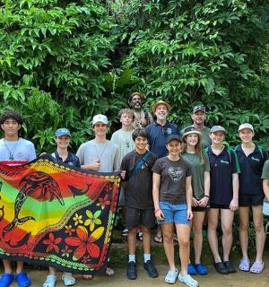 a group of people are posing for a picture