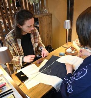 a man and a woman sitting at a table
