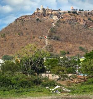 a hill with a castle on top of it