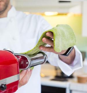 a man is using a cloth on a toaster