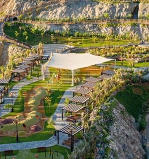 an aerial view of a resort on the side of a mountain