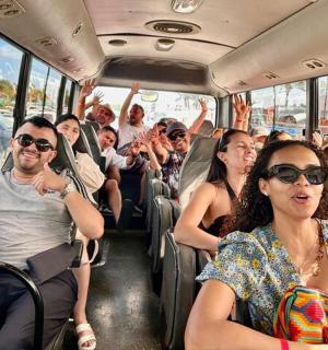 a group of people riding on a bus