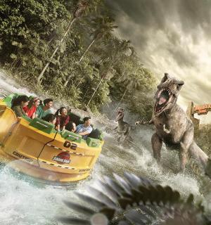 a group of people riding on a ride in a ride in the water