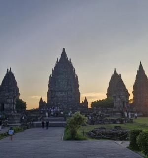 a view of a temple at sunset