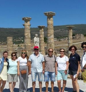 a group of people standing in front of a temple