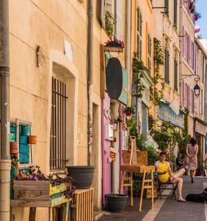 a group of people walking down a street