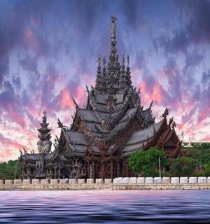 a large building sitting on top of a body of water