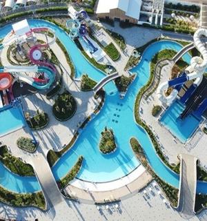 an aerial view of a pool at a resort