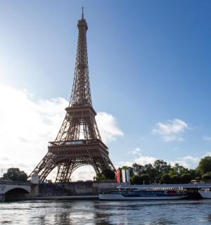 a view of the eiffel tower from the river