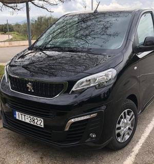 a black van parked in a parking lot