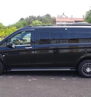 a black van parked in a parking lot