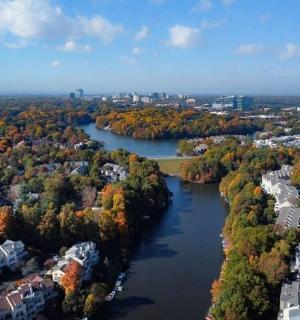 an aerial view of a river in a city
