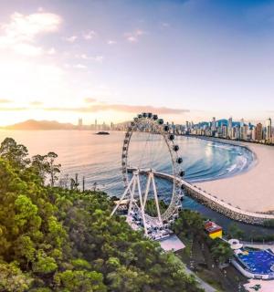 an aerial view of a city with a roller coaster