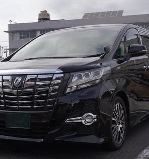 a black suv parked in a parking lot