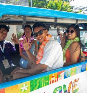 a group of people sitting in a bus