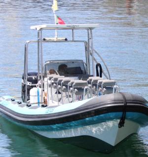 a small boat floating on the water