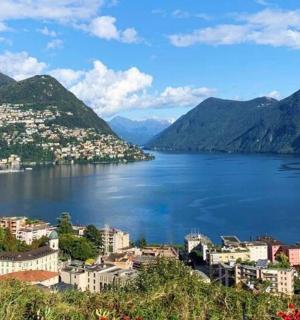 a view of a large body of water with mountains