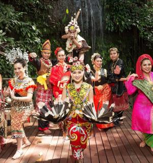 a group of people in costumes posing for a picture