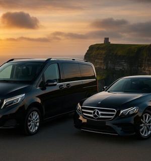 two vehicles parked next to each other near the ocean