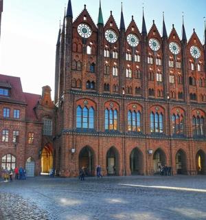 a large brick building with a clock tower