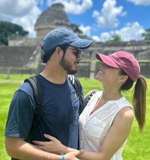 a man and a woman standing next to each other