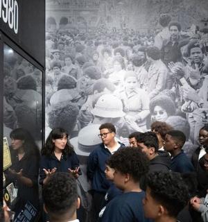 a group of people standing in a crowd