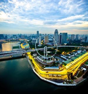 an overhead view of a large city with a bridge