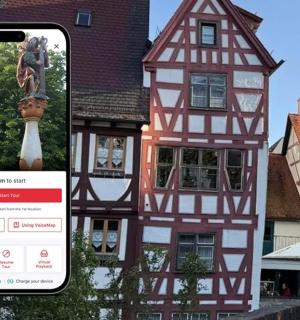 an iphone taking a picture of a building