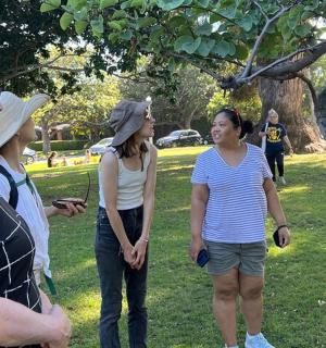 a group of people standing in a park