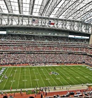 a large crowd of people at a football game