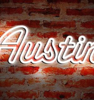 neonový nápis na cihlové zdi