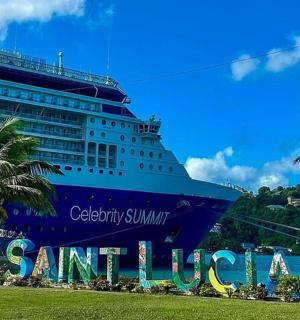 a cruise ship is docked in a harbor