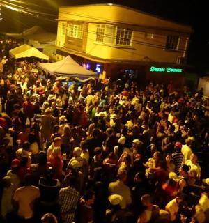 a large crowd of people standing outside a building