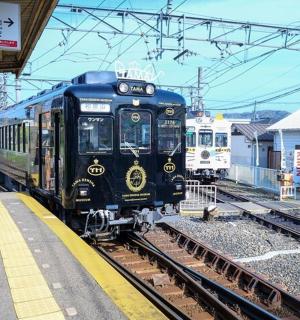 a train on the tracks at a train station