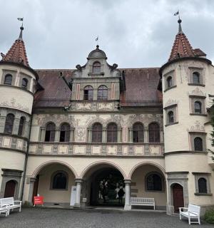 a large building with two towers on top of it