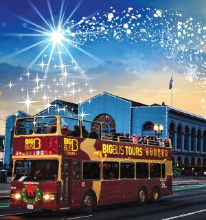 a double decker bus driving down a city street