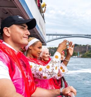 a group of people on a boat in the water