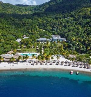 an aerial view of a beach with a resort
