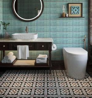 a bathroom with a sink and a toilet and a mirror