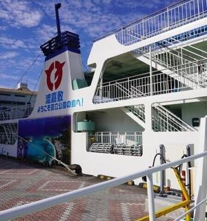 a cruise ship with a spiral staircase on the side
