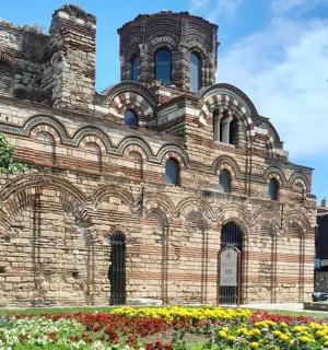 a large brick building with a clock tower on it