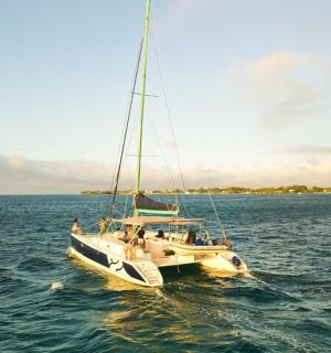 a boat in the water with people on it