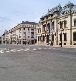 an empty street in a city with buildings