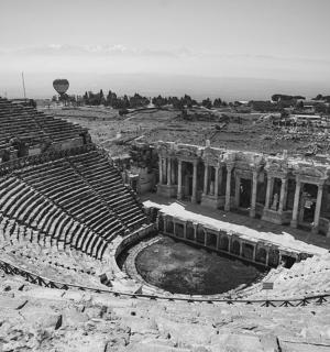 a black and white photo of an amphitheater
