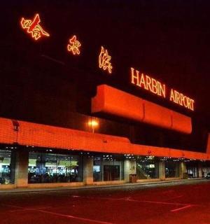 a building with neon signs on the side of it