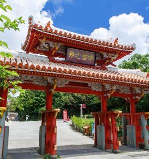 a red structure with a roof on top of it