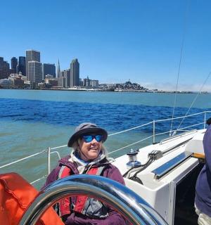 a couple of people on a boat in the water