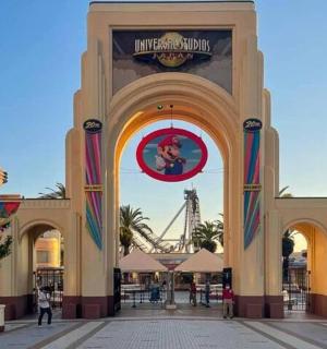 an entrance to a shopping mall with the amusement park